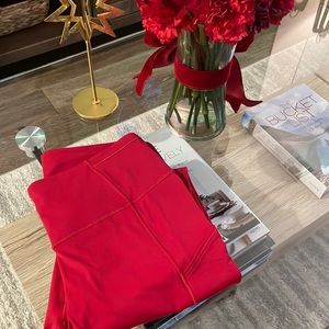 Lululemon red 7/8 length. Great fit. Worn once.